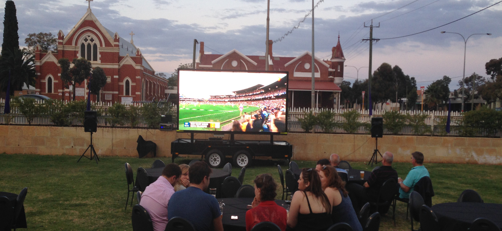 Mega Screen set up for a nighttime outdoor event