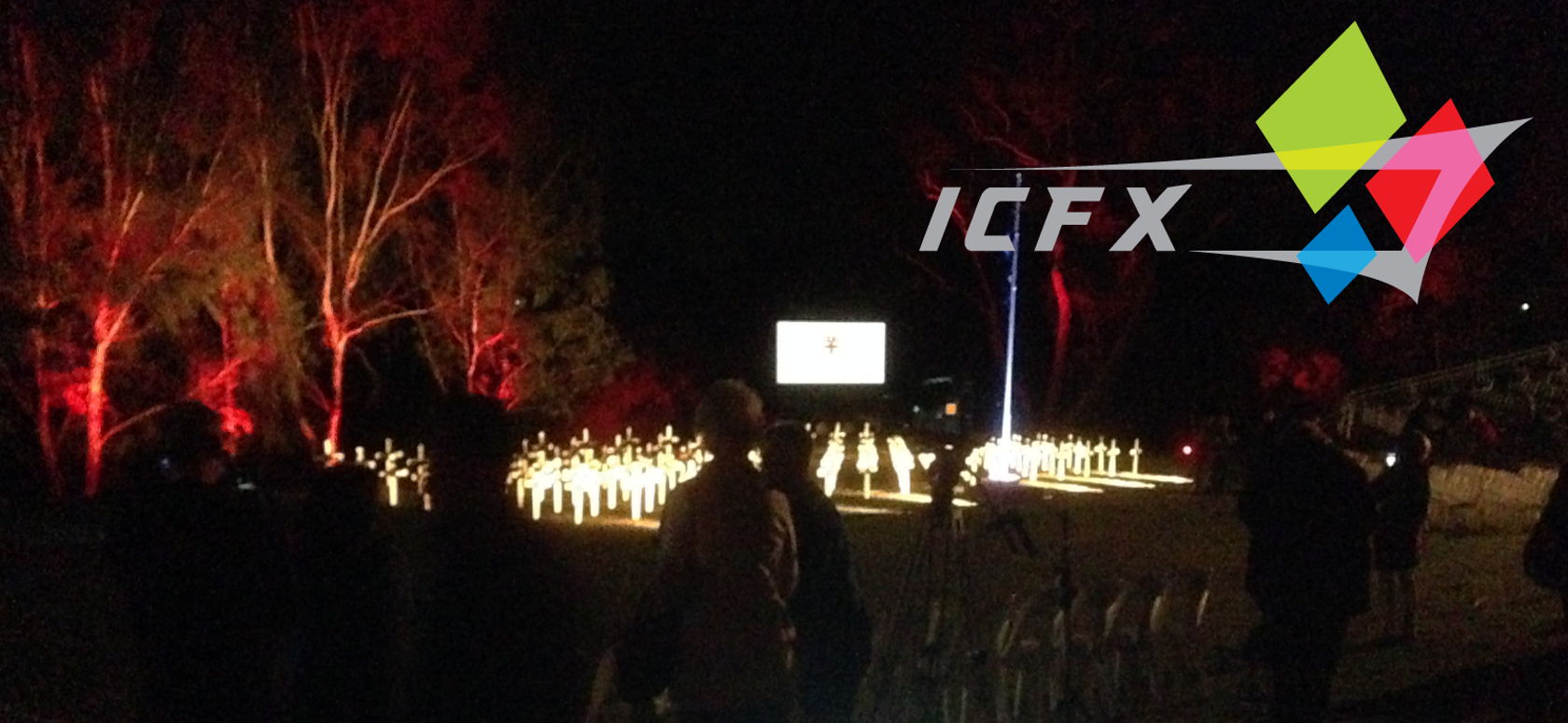 Night time photo of a memorial service